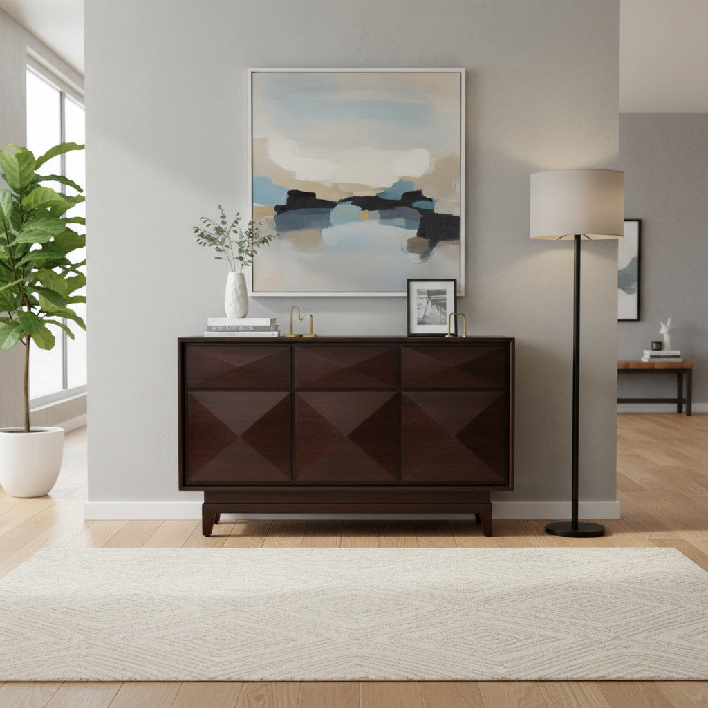 Elegant dark wood sideboard featuring three cabinet doors with raised geometric diamond detailing, clean lines, and short wooden legs for a sophisticated contemporary interior.