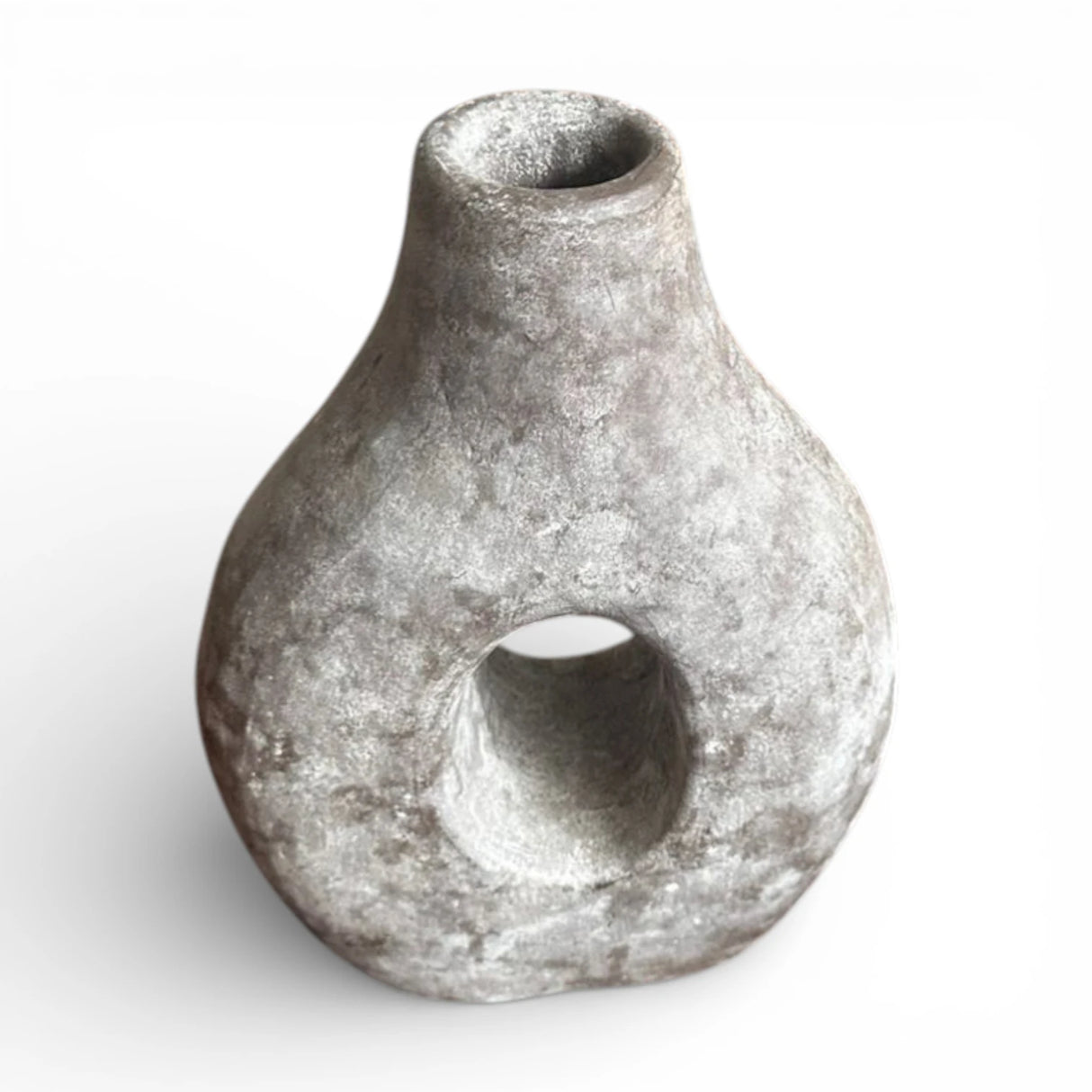 Decorative vase featuring a sculptural circular cut-out, rounded silhouette, and textured stone-effect finish. A contemporary statement piece perfect for dried botanicals, shelves, consoles, coffee tables, and modern, Scandinavian, wabi-sabi, industrial, or minimalist interiors.