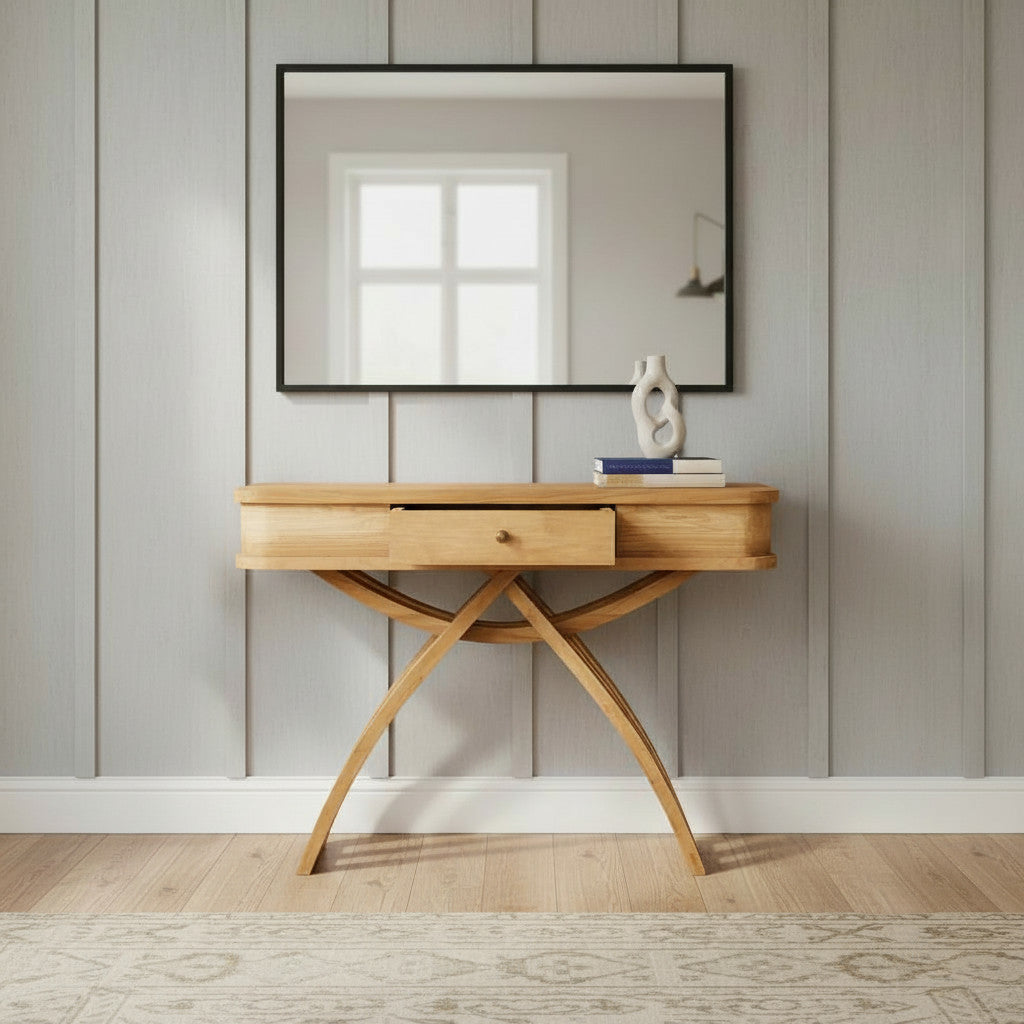 Elegant natural wood console table featuring a central drawer, distinctive curved cross-leg design, and a smooth wooden top for a refined contemporary look.