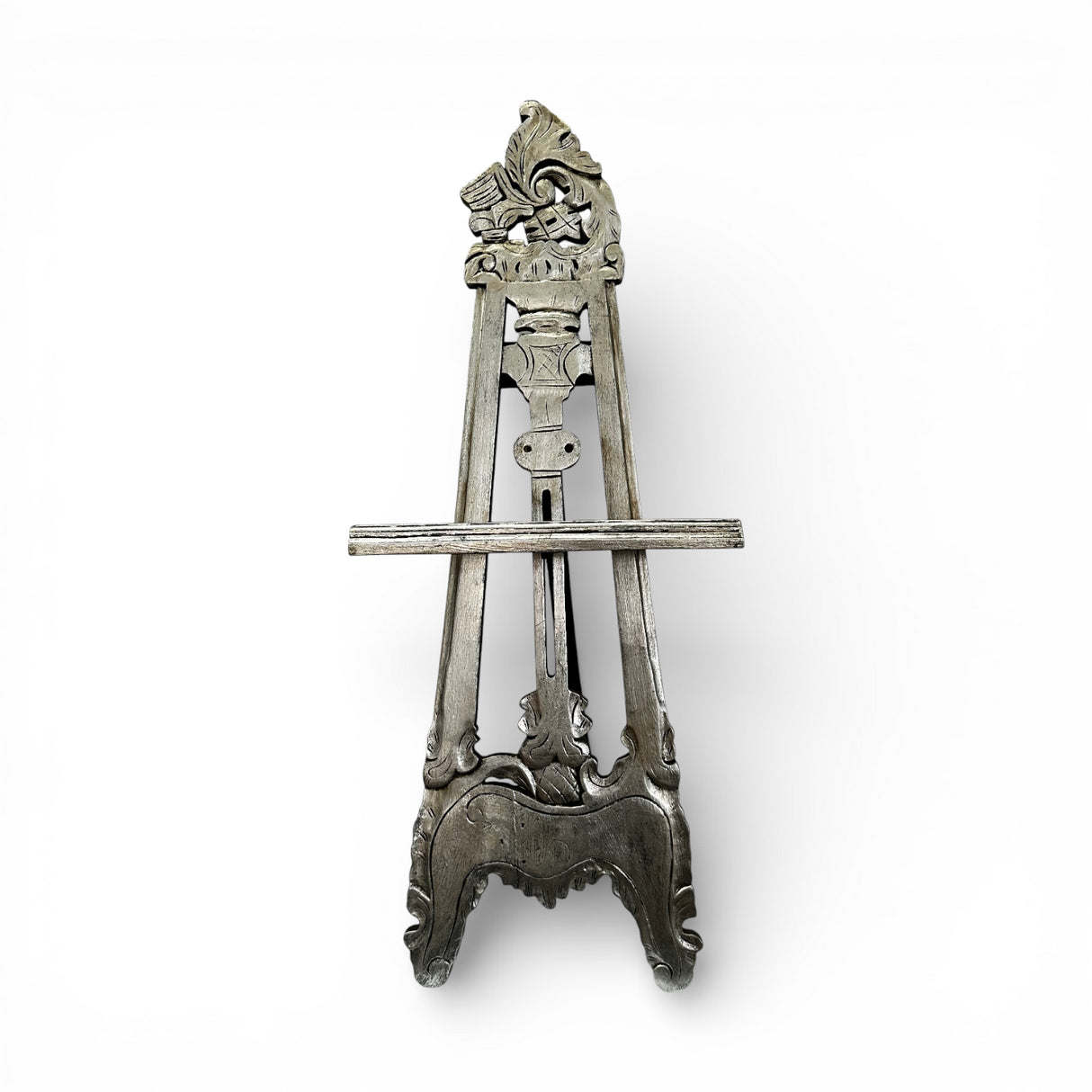 Handcrafted vintage-style wooden display easel with intricate carved detailing, distressed grey finish, and adjustable support, ideal for displaying artwork, mirrors, signage, or decorative pieces.