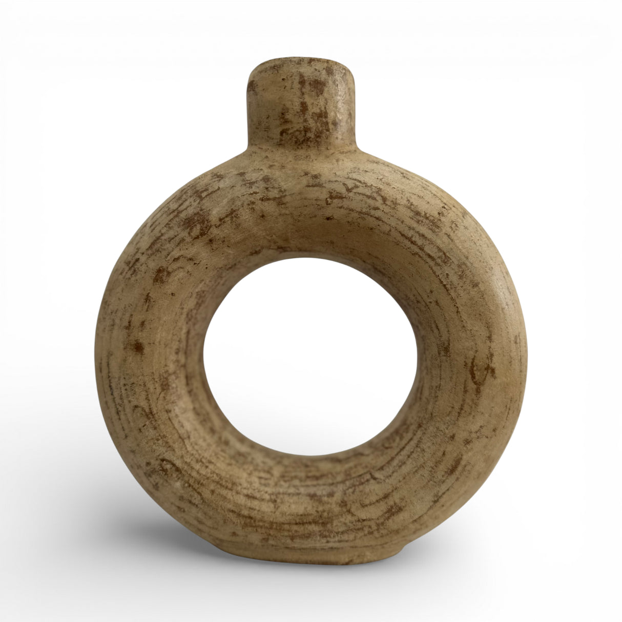 Sculptural stoneware vase with a warm natural finish, featuring a circular cut-out centre, rounded halo silhouette, and short cylindrical neck. A handcrafted contemporary decorative vase that adds organic texture and modern elegance to shelves, console tables, coffee tables, or styled interiors.