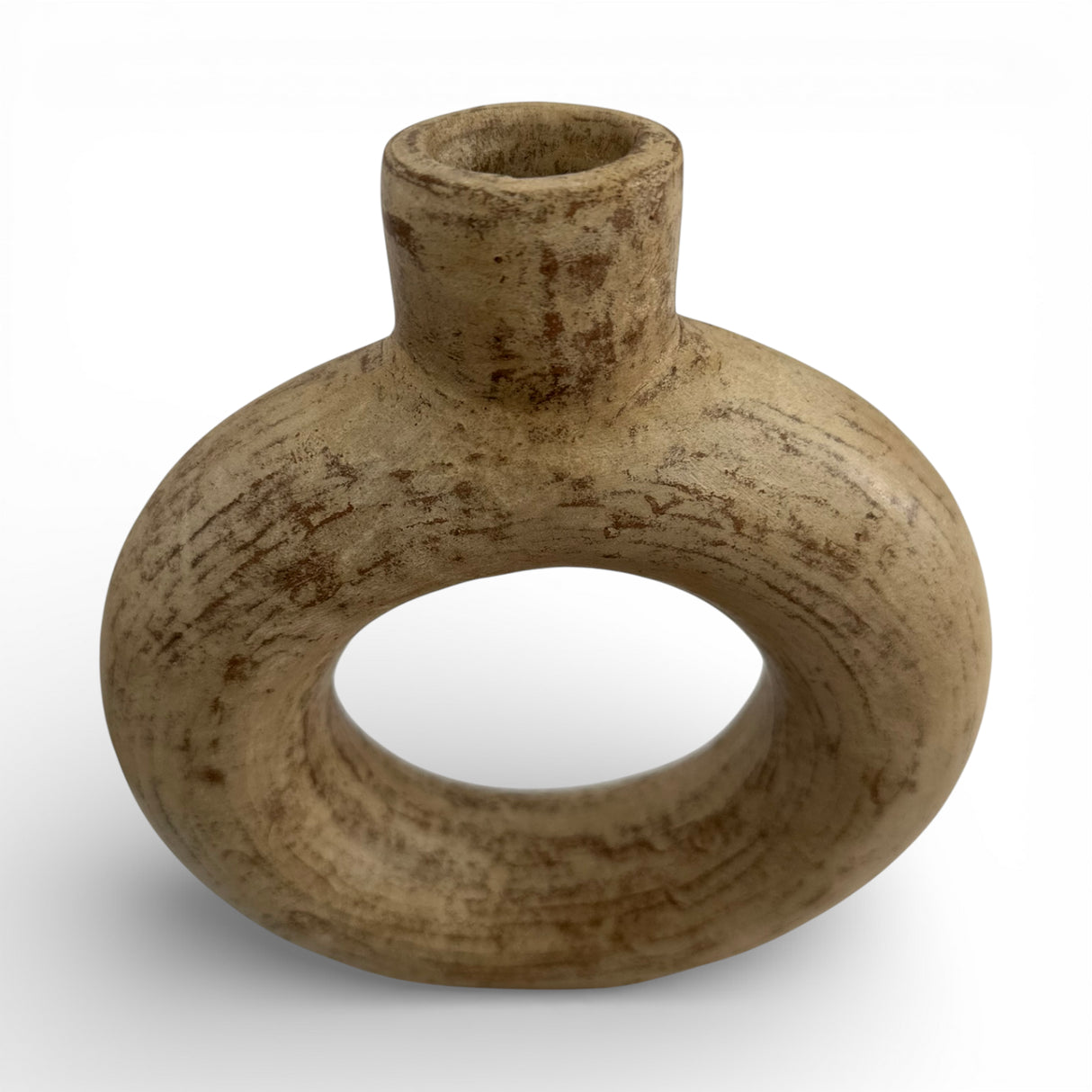 Sculptural stoneware vase with a warm natural finish, featuring a circular cut-out centre, rounded halo silhouette, and short cylindrical neck. A handcrafted contemporary decorative vase that adds organic texture and modern elegance to shelves, console tables, coffee tables, or styled interiors.