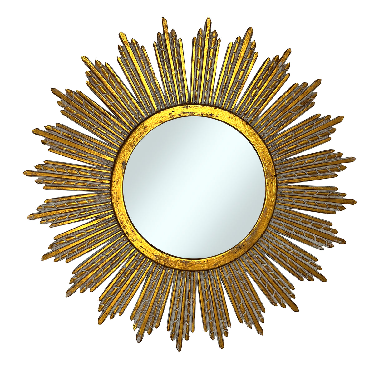 Decorative round wall mirror with an antique gold radiating sunburst frame featuring long textured rays and a distressed metallic finish, adding timeless elegance and a luxurious focal point to any interior.