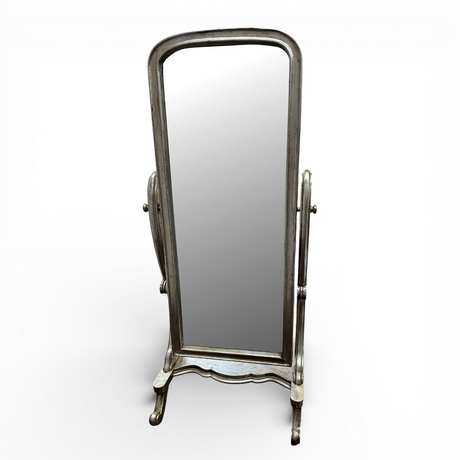 Antique silver freestanding cheval floor mirror featuring an elegant arched frame, adjustable tilt mechanism, and full-length mirror. This timeless dressing mirror adds classic sophistication to bedrooms, dressing rooms, walk-in wardrobes, and living spaces, complementing vintage, French country, farmhouse, luxury, and contemporary interiors.