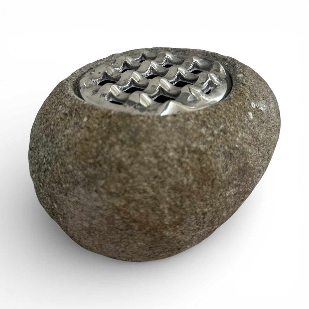 Decorative beige marble potpourri bowl featuring a polished natural stone finish and a decorative silver metal lattice lid, styled on a contemporary coffee table. A timeless accent piece that adds warmth and elegance to modern living rooms, consoles, shelves, and luxury interiors.