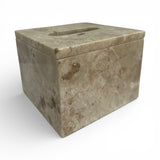 Elegant beige marble tissue box cover featuring a polished natural stone finish with subtle natural veining and a sleek rectangular tissue opening. A timeless home accessory that adds sophistication to bathrooms, bedrooms, offices, living rooms, and luxury interiors.