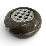 Elegant black marble potpourri bowl featuring a polished natural stone finish with subtle gold veining and a decorative silver metal lattice lid. A sophisticated home décor accessory ideal for coffee tables, consoles, bathrooms, or luxury living spaces.