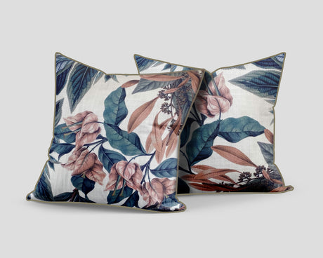 Set of three decorative scatter cushions featuring soft blush florals and deep blue botanical leaves on a neutral background, designed to add elegant colour and pattern to stylish interiors.