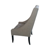 Modern high-back dining chair upholstered in textured grey fabric with contrasting patterned seat and backrest panels. Featuring gently curved wingback sides and sleek dark wooden legs, this elegant chair is ideal for dining rooms, restaurants, boutique hotels, or contemporary interiors.