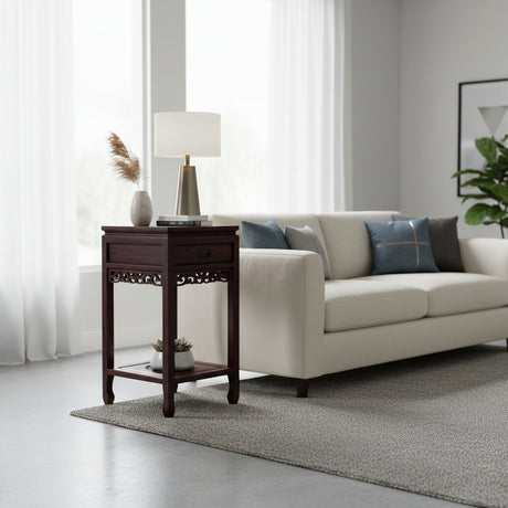 Living room with a beige sofa, wooden side table, and decorative elements.