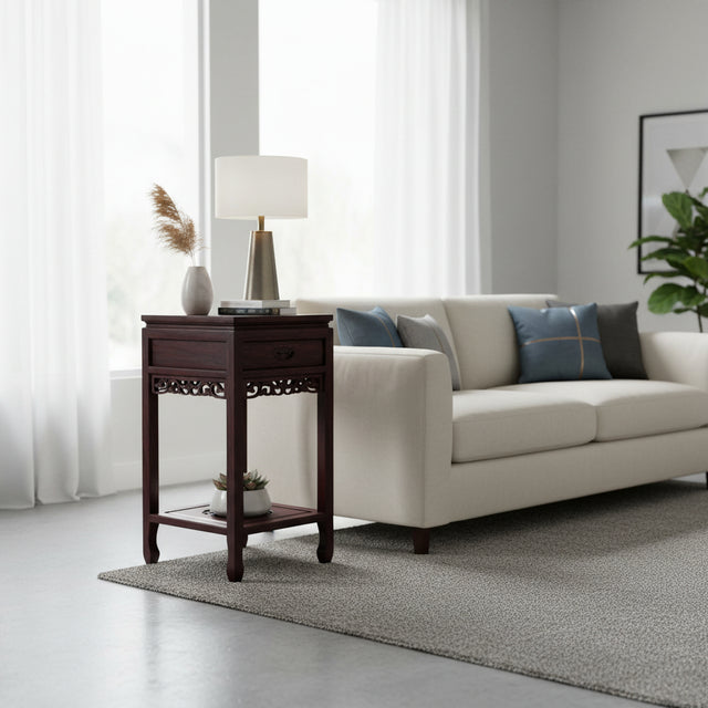 Living room with a beige sofa, wooden side table, and decorative elements.