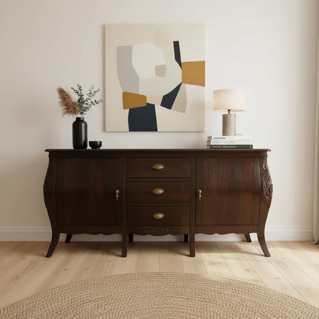Elegant dark wood sideboard featuring three central drawers, two cabinet doors, brass hardware, curved legs, and subtle carved detailing for a sophisticated classic look.
