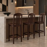 Three dark wood bar stools with tall vertical slat backrests, wooden seats, straight legs, and rectangular footrests beside a kitchen island.