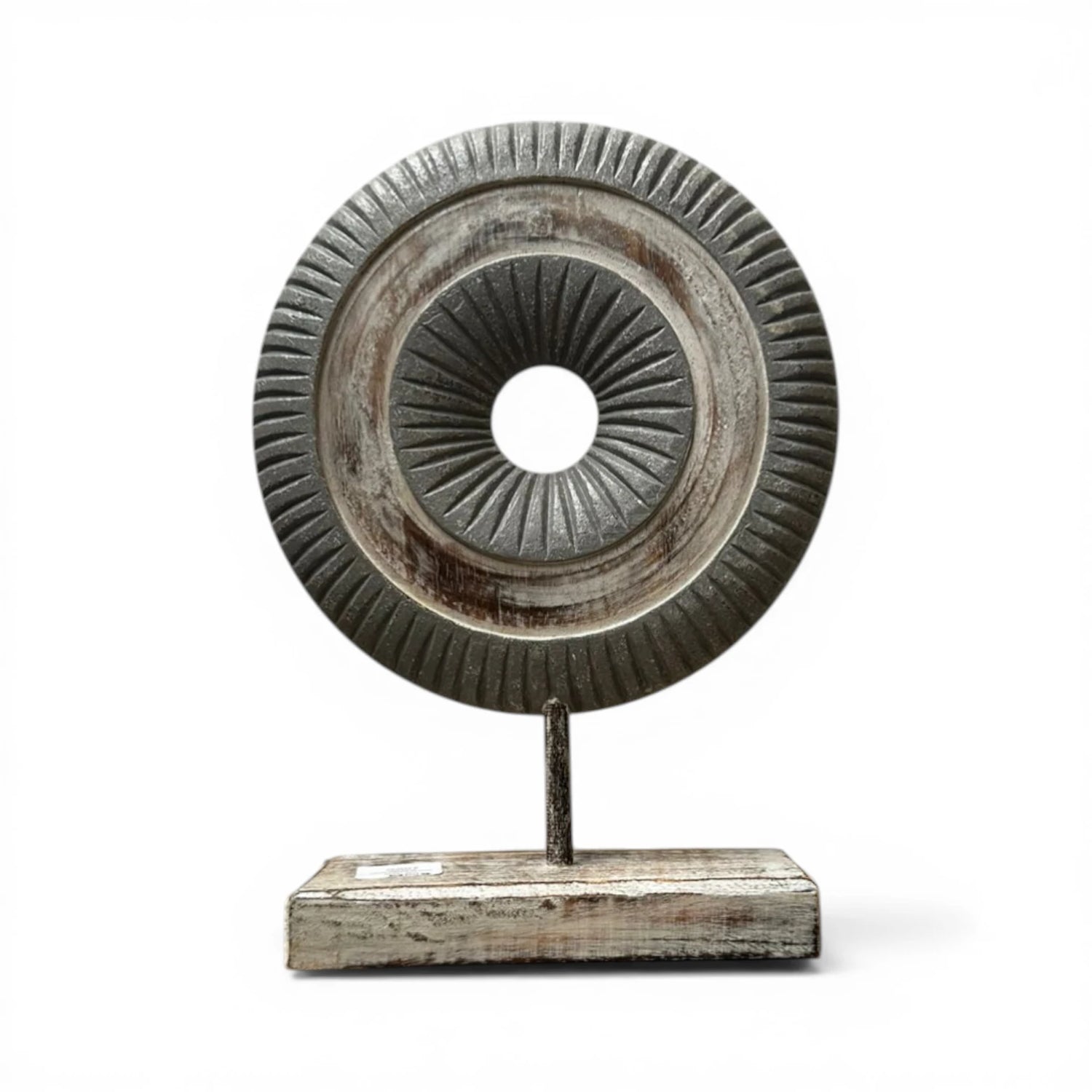 Decorative dark carved wooden ring sculpture mounted on a sturdy stand, featuring detailed radial carving and a distressed charcoal and natural wood finish. A contemporary tabletop accent that adds texture and sophistication to modern, industrial, Scandinavian, and rustic home décor.