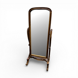 Distressed whitewashed freestanding cheval floor mirror featuring a gracefully arched wooden frame, decorative carved base, and adjustable tilt mechanism. This elegant full-length dressing mirror brings timeless vintage charm to bedrooms, dressing rooms, walk-in wardrobes, and living spaces while complementing farmhouse, French country, coastal, rustic, and luxury interiors.