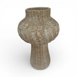 Fluted stoneware sculptural vase with a textured natural beige finish, featuring a rounded bulb-shaped body, narrow cylindrical neck, and vertical ribbed detailing. A timeless decorative accent perfect for styling shelves, consoles, coffee tables, or modern interiors.