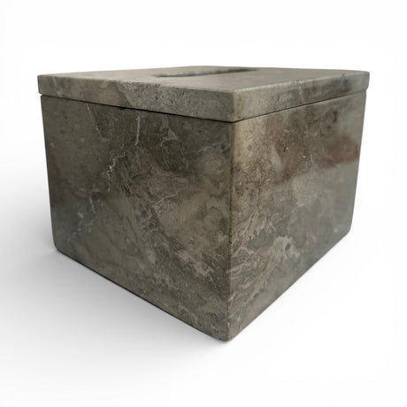 Square grey marble tissue box cover with a polished natural stone finish and a top opening for dispensing tissues, offering a sleek and contemporary look for bathrooms, bedrooms, or living spaces.