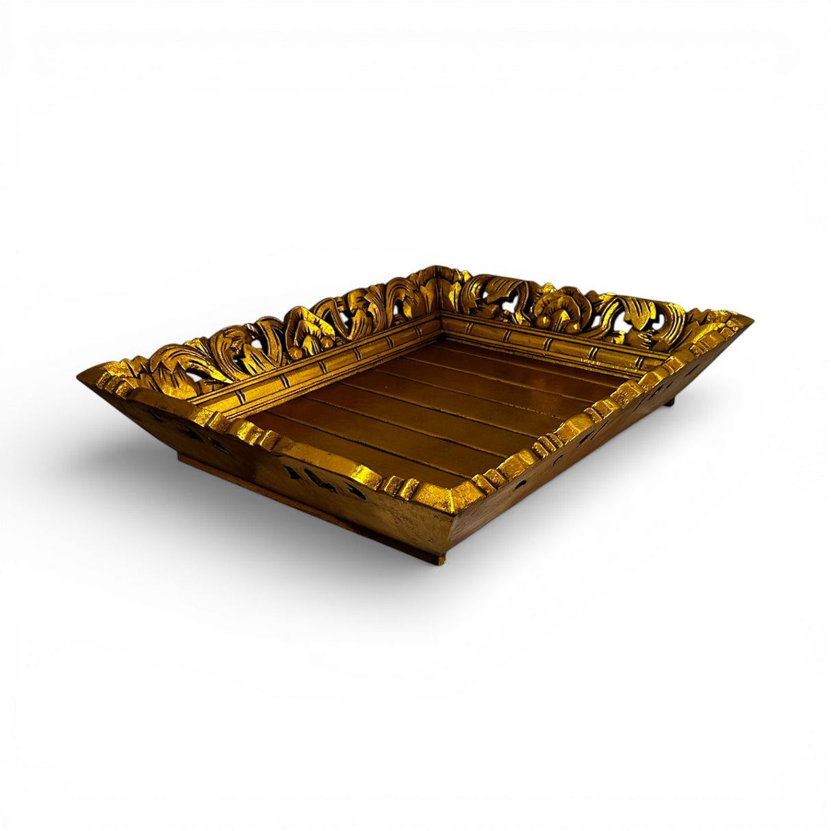 Hand-carved square decorative tray in a rich gold finish with intricate floral-inspired detailing along the edges. A luxurious statement piece ideal for styling candles, vases, or decorative accessories on a coffee table, console, or ottoman.