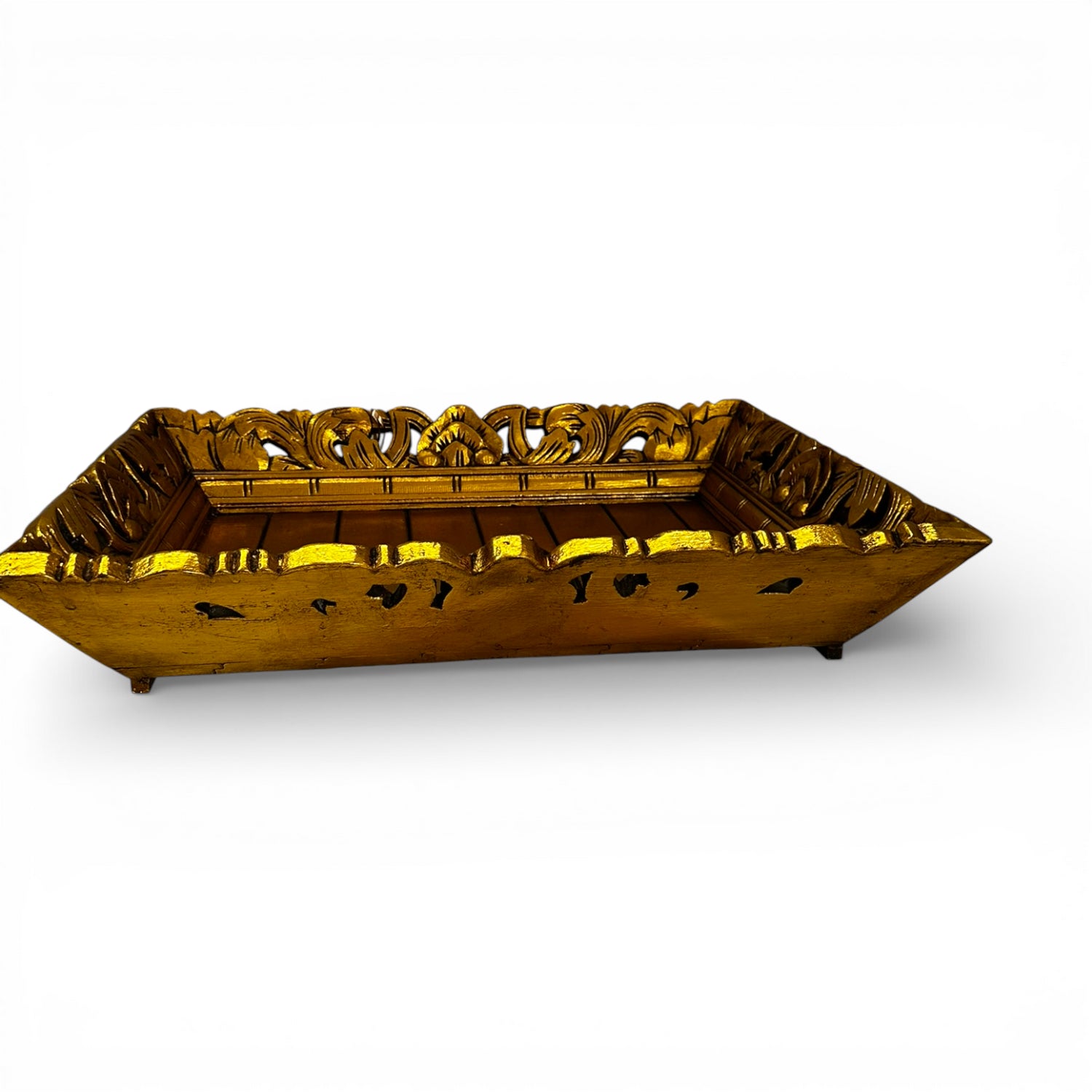 Hand-carved square decorative tray in a rich gold finish with intricate floral-inspired detailing along the edges. A luxurious statement piece ideal for styling candles, vases, or decorative accessories on a coffee table, console, or ottoman.