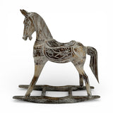 Hand-carved rustic wooden rocking horse sculpture featuring intricate carved detailing and a distressed whitewashed finish, perfect as a decorative accent for consoles, shelves, or coffee tables in classic, farmhouse, or contemporary interiors.
