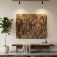 Handcrafted driftwood wall art featuring hundreds of carved abstract faces with natural wood textures and varied neutral tones. This striking African-inspired statement piece adds organic character to modern, rustic, coastal, or contemporary interiors.