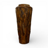 Handcrafted live edge wooden pedestal planter made from solid natural timber, featuring rich organic wood grain and a sculptural tapered design, perfect for displaying indoor plants or as a decorative accent in contemporary and rustic interiors.