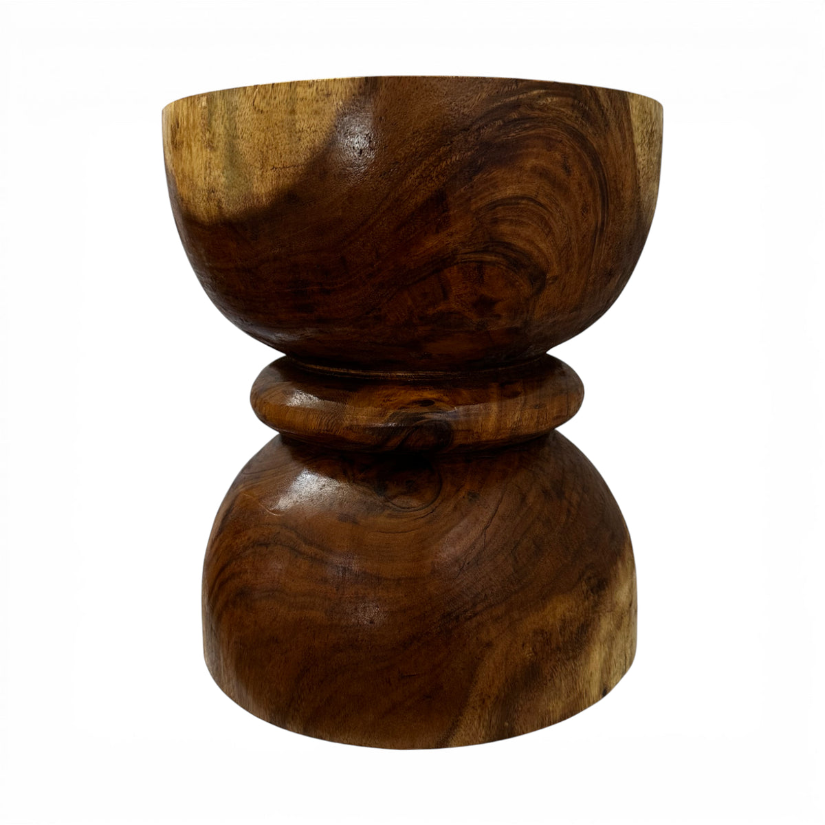 Handcrafted sculptural side table crafted from solid teak wood, featuring a smooth rounded tabletop and an elegant hourglass pedestal base that highlights the rich natural wood grain. A timeless statement piece perfect for living rooms, bedrooms, boutique hotels, lodges, or contemporary luxury interiors.