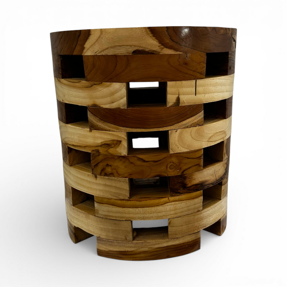 Handcrafted cylindrical side table crafted from solid teak wood, featuring a contemporary open-block design with integrated storage compartments and beautifully contrasting natural wood tones. This functional statement piece is perfect for living rooms, bedrooms, boutique hotels, lodges, or modern rustic interiors.