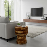 Handcrafted round side table crafted from solid teak wood with a sculptural hourglass pedestal base. Showcasing a unique patchwork of natural timber grain and warm wood tones, this contemporary accent table is perfect for living rooms, bedrooms, boutique hotels, lodges, or modern rustic interiors.
