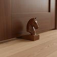 Handcrafted wooden horse head door stop featuring a beautifully carved horse silhouette with a rich natural wood finish. This decorative door wedge blends functionality with timeless equestrian style, making it ideal for modern, rustic, farmhouse, or country-inspired interiors.