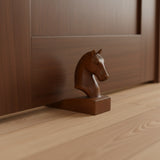 Handcrafted wooden horse head door stop featuring a beautifully carved horse silhouette with a rich natural wood finish. This decorative door wedge blends functionality with timeless equestrian style, making it ideal for modern, rustic, farmhouse, or country-inspired interiors.