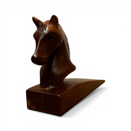 Handcrafted wooden horse head door stop featuring a beautifully carved horse silhouette with a rich natural wood finish. This decorative door wedge blends functionality with timeless equestrian style, making it ideal for modern, rustic, farmhouse, or country-inspired interiors.