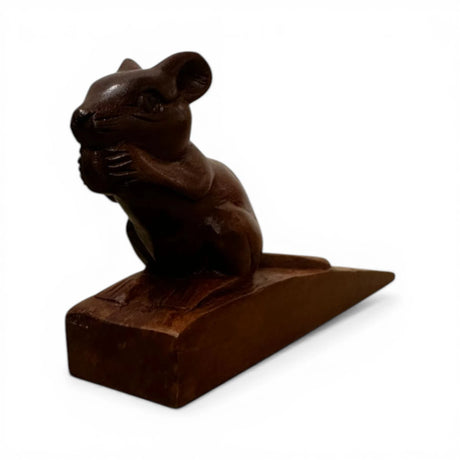 Handcrafted wooden squirrel door stop featuring a charming squirrel holding an acorn, finished in rich natural wood tones. This decorative door wedge combines functionality with whimsical style, making it perfect for modern, rustic, woodland, or farmhouse home décor.