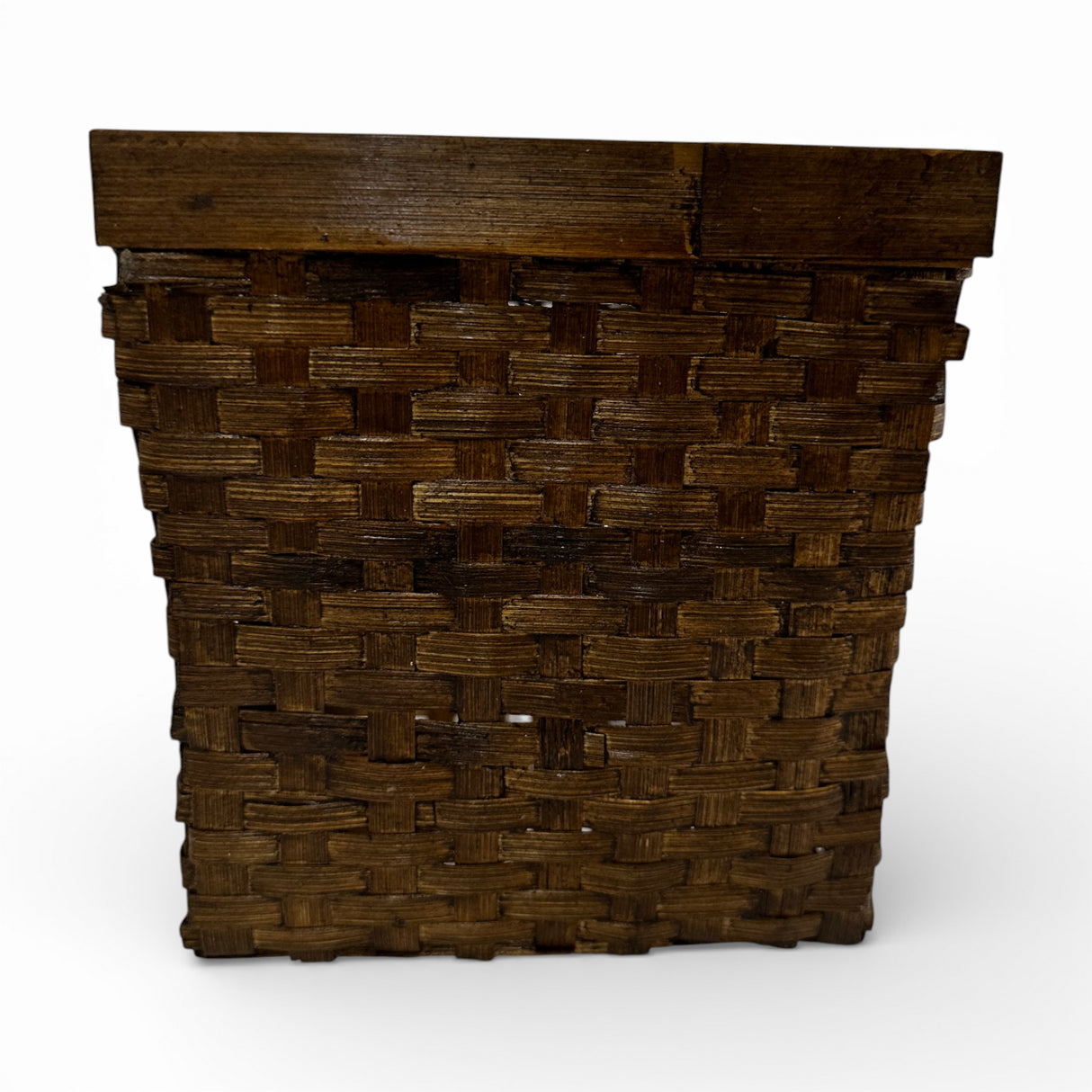 Handwoven dark rattan storage basket with a tapered square design and rich espresso finish, ideal for organizing household essentials, shelving, bathrooms, offices, or decorative storage.