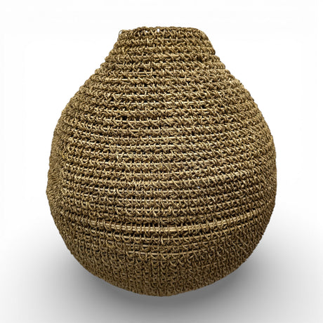 Handwoven natural decorative vase with a rounded teardrop silhouette, narrow neck, and richly textured woven finish, perfect for displaying dried botanicals or adding warm organic texture and artisanal elegance to contemporary, coastal, or rustic interiors.