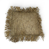 Handwoven natural scatter cushion with a richly textured woven finish and decorative raffia fringe on all four sides, perfect for adding warm organic texture, relaxed coastal style, and artisanal charm to sofas, beds, or occasional chairs.