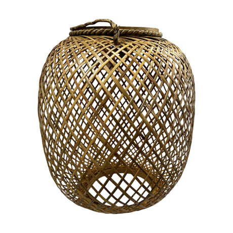 Handwoven natural rattan lantern featuring an open crisscross weave, rounded barrel-shaped silhouette, and integrated rope carry handle, perfect for displaying candles and adding warm organic style to indoor or outdoor spaces.