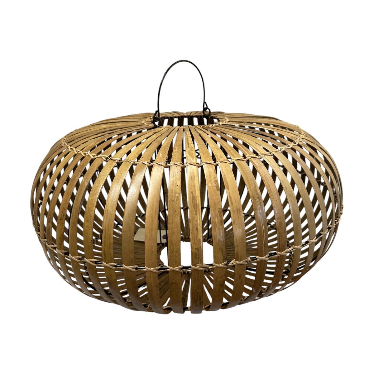 Handwoven oval rattan pendant light featuring an open slatted design with a natural wood finish and suspended metal handle, creating a warm, airy statement for dining rooms, living spaces, bedrooms, or covered patios.