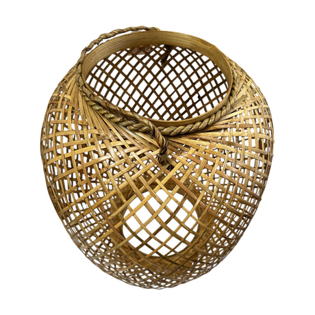 Handwoven natural rattan lantern featuring an open lattice weave, rounded silhouette, and rope carry handle, perfect for holding candles and adding warm organic style to indoor or outdoor spaces.