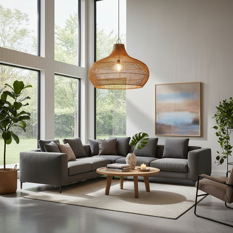 Contemporary handwoven rattan pendant light featuring a wide sculptural shade in a natural finish that softly diffuses warm ambient light. A stylish statement ceiling light perfect for dining rooms, living areas, kitchens, boutique hotels, and modern interiors.