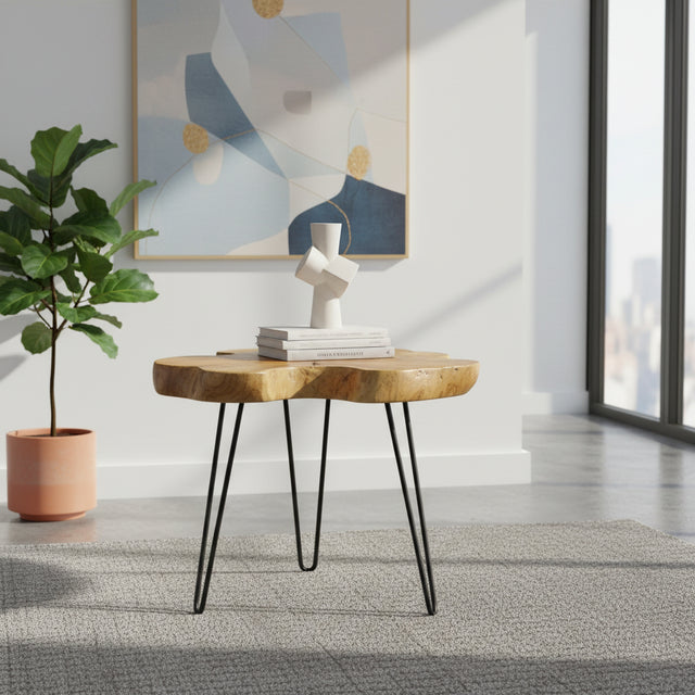 Modern coffee table featuring a solid live edge wooden tabletop with natural organic grain and sleek black hairpin legs. Blending rustic charm with contemporary design, this statement table is perfect for living rooms, apartments, boutique hotels, or modern industrial interiors.