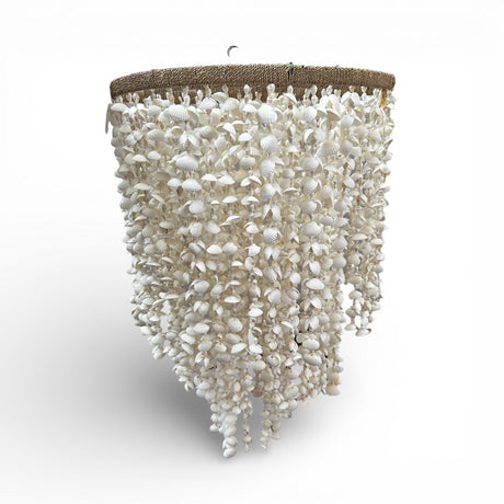 Handcrafted cascading chandelier featuring hundreds of natural white seashells suspended from a woven circular frame. This elegant coastal-inspired pendant light creates a soft, organic statement, making it perfect for dining rooms, living spaces, boutique hotels, beach homes, luxury lodges, or contemporary interiors.