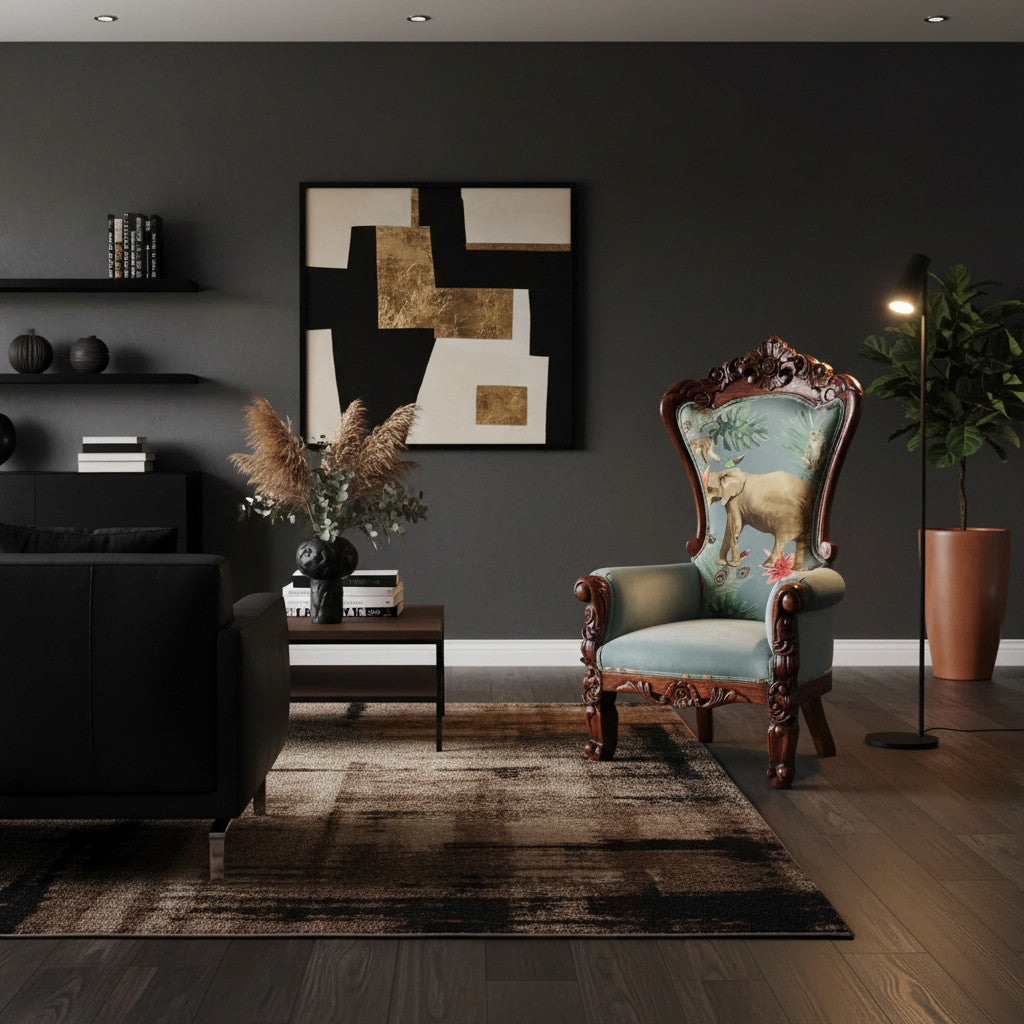 Luxury accent chair featuring a hand-carved dark wood frame, soft sage green upholstery, and a decorative high back showcasing an elegant elephant illustration with botanical details. A timeless statement piece for sophisticated living spaces, boutique hotels, or executive lounges.