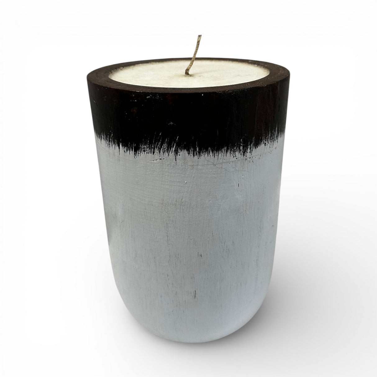 Handcrafted candle in a solid wooden vessel featuring a contemporary black and white two-tone finish with a natural wax fill. A stylish decorative accent perfect for coffee tables, shelves, bedrooms, boutique hotels, spas, or modern minimalist interiors.