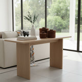 Modern minimalist oak console table with clean architectural lines and a natural wood finish, styled with decorative accessories and handcrafted beaded storage baskets in a bright contemporary living space.