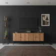 Modern natural wood TV unit with four cabinet doors, black metal legs, and a minimalist design, styled in a sophisticated contemporary living room.
