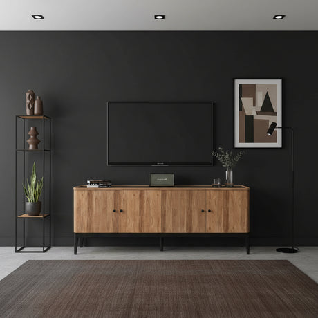 Modern natural wood TV unit with four cabinet doors, black metal legs, and a minimalist design, styled in a sophisticated contemporary living room.