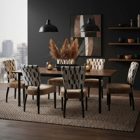 Contemporary six-seater dining set featuring a rectangular wooden dining table and six upholstered dining chairs with a bold black and cream patterned fabric, black legs, and soft brown seats, styled in a modern dining room.