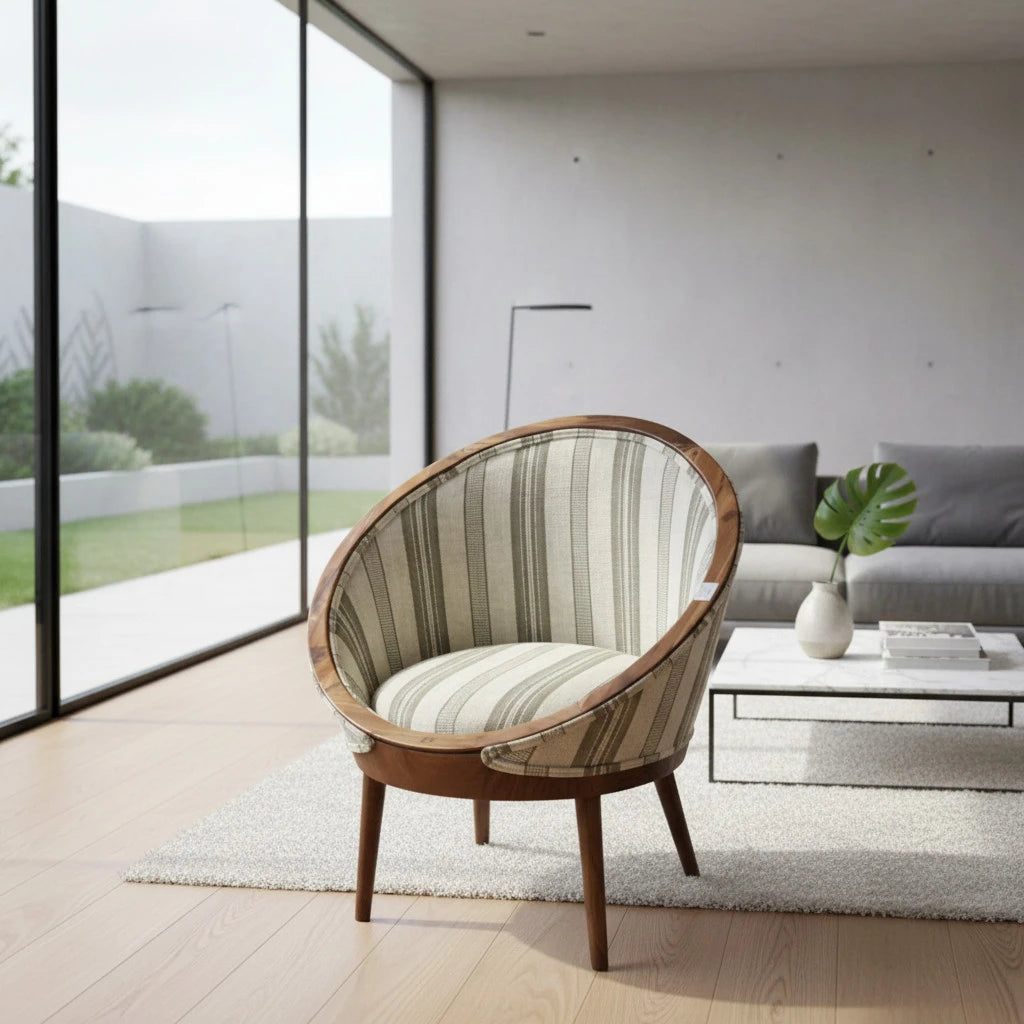 Contemporary barrel accent chair featuring a solid wood frame, neutral striped upholstered fabric, and tapered wooden legs. A stylish occasional chair that brings warmth and modern sophistication to living rooms, reading nooks, bedrooms, or boutique hotel lounges.