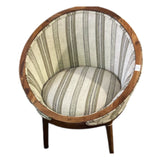 Contemporary barrel accent chair featuring a solid wood frame, neutral striped upholstered fabric, and tapered wooden legs. A stylish occasional chair that brings warmth and modern sophistication to living rooms, reading nooks, bedrooms, or boutique hotel lounges.
